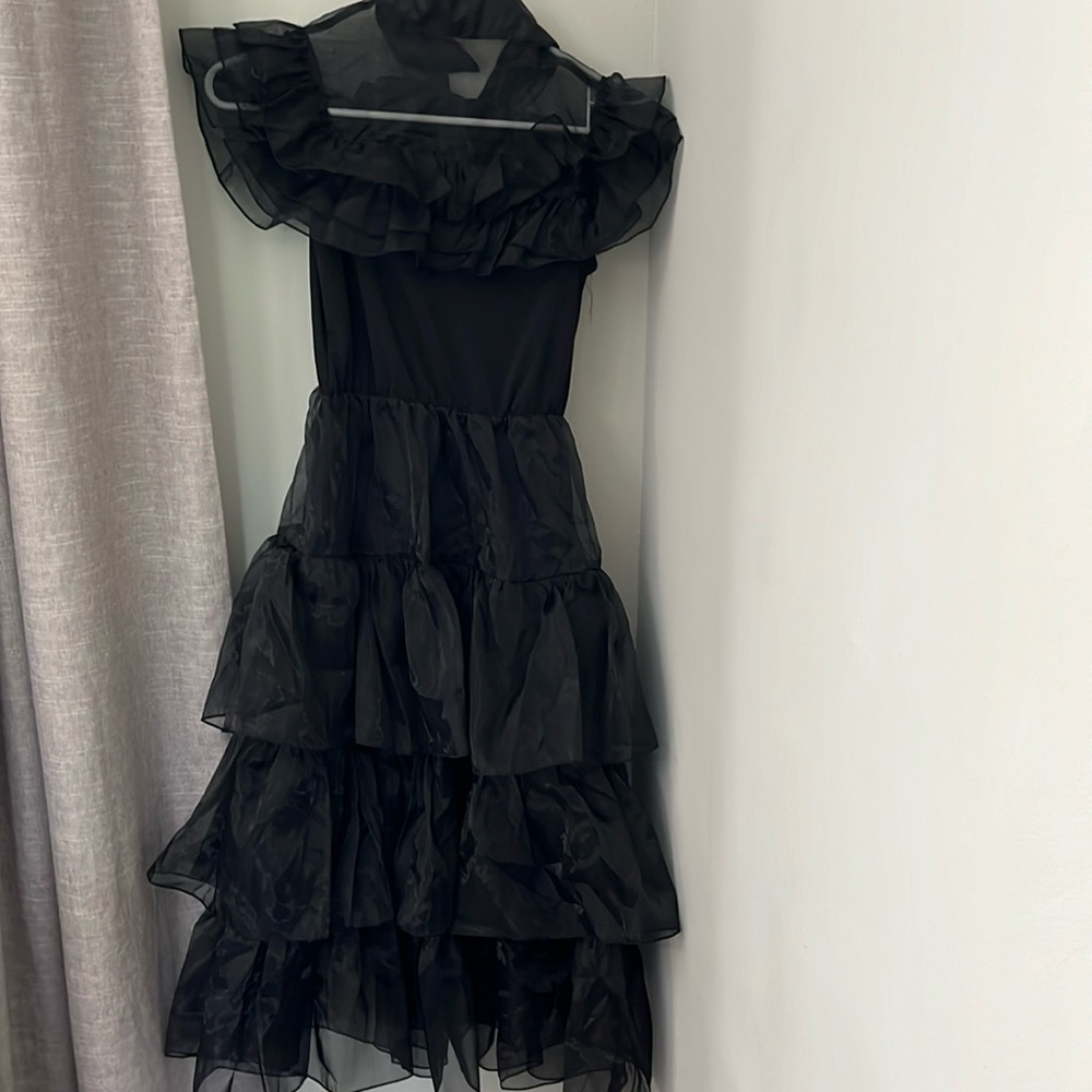 Wendy’s costume from Adam’s Family. Size